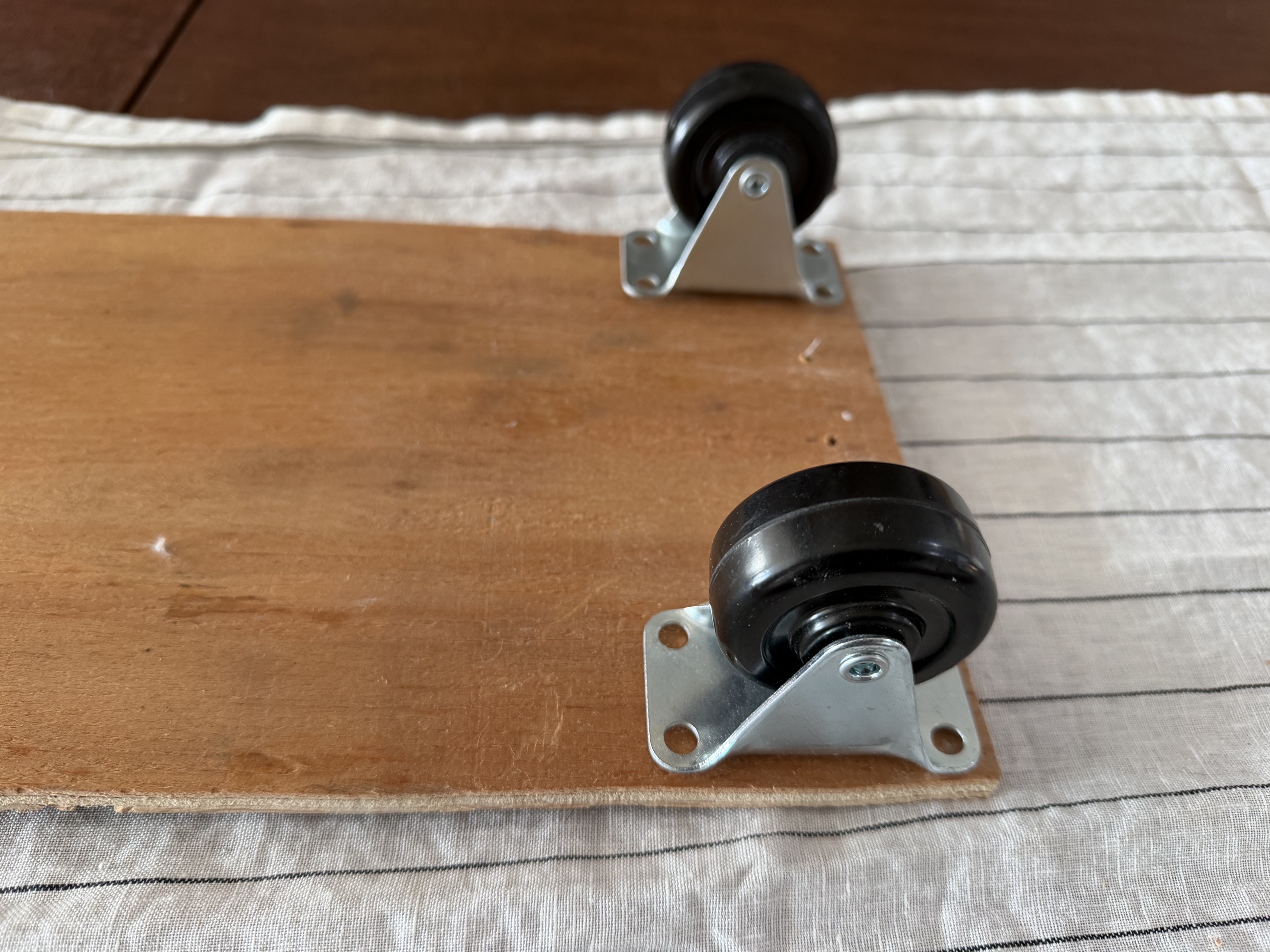 Casters installed beneath the cat-food restrictor ramp